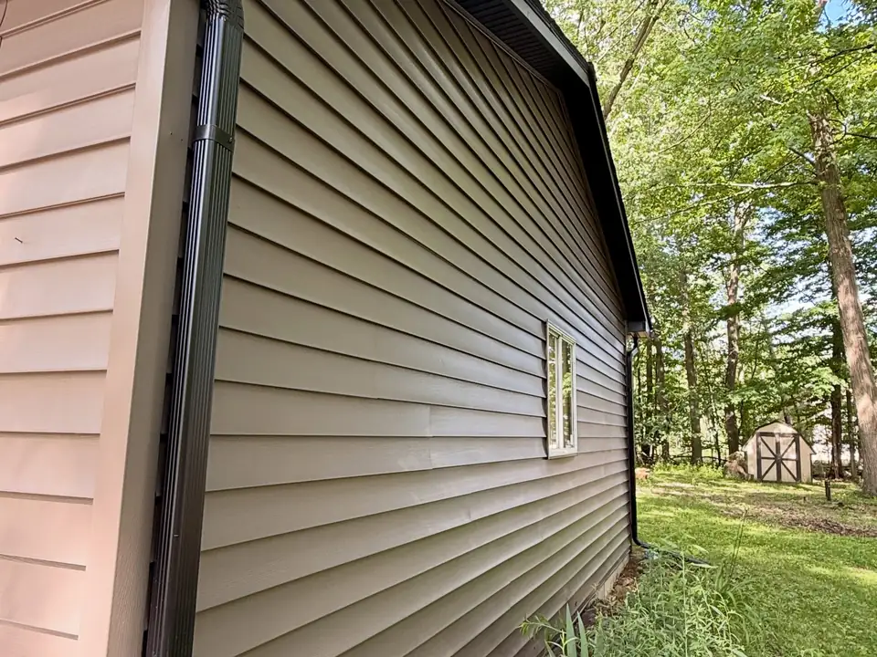 Close-up of smooth repainted tan lap siding